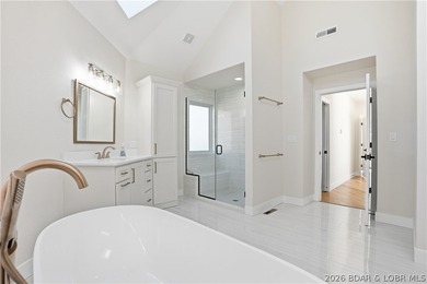 Experience unparalleled lakeside luxury in this fully remodeled - photo 16