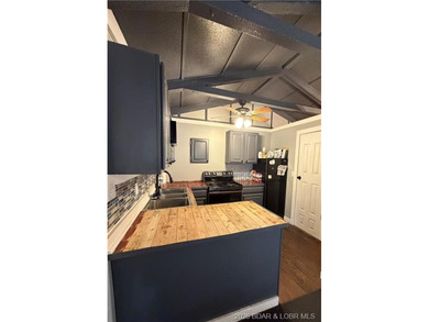 This affordable cabin in the woods is a smart pick for investors - photo 6