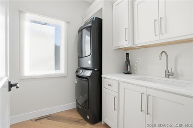 Experience unparalleled lakeside luxury in this fully remodeled - photo 35