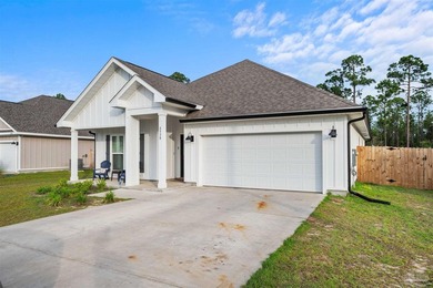 Welcome to this beautiful 4-bedroom, 2-bathroom home offering 1 - photo 4