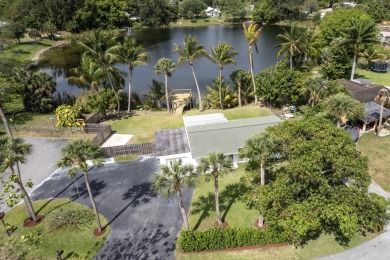 Lake Home For Sale in West Palm Beach, Florida