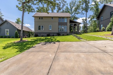 REDUCED! Lake Martin Living made EASY! Talisi Cove is a gated - photo 2
