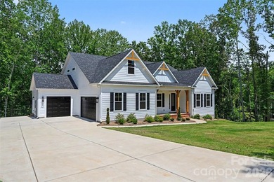 Move-in ready new construction in the gated lakefront community - photo 1