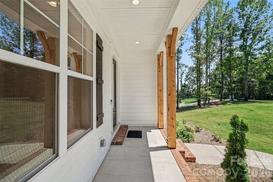 Move-in ready new construction in the gated lakefront community - photo 8