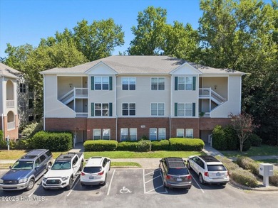 Beautiful 3-bedroom, 2-bath condo ideally located near the - photo 1
