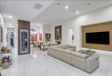 This stunning, fully gated one-story estate is ideally located - photo 12