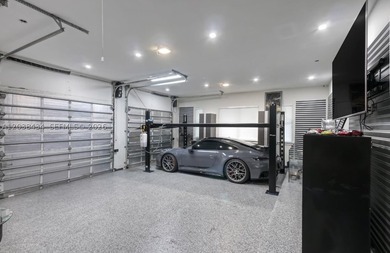This stunning, fully gated one-story estate is ideally located - photo 33