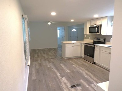 Turnkey Ready Comfortable Open Floor Plan. Bedrooms are on - photo 4
