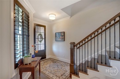 This spacious three-story townhouse offers 2,118 square feet of - photo 12
