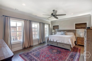 This spacious three-story townhouse offers 2,118 square feet of - photo 22