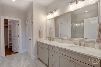 This spacious three-story townhouse offers 2,118 square feet of - photo 31