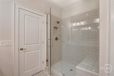 This spacious three-story townhouse offers 2,118 square feet of - photo 32