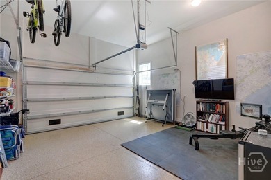 This spacious three-story townhouse offers 2,118 square feet of - photo 37