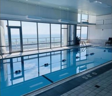 Perched on the 24th floor of sought-after 1400 Museum Park, this - photo 3