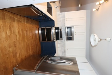 Perched on the 24th floor of sought-after 1400 Museum Park, this - photo 4