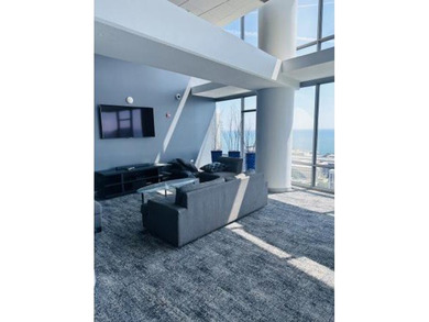 Perched on the 24th floor of sought-after 1400 Museum Park, this - photo 5