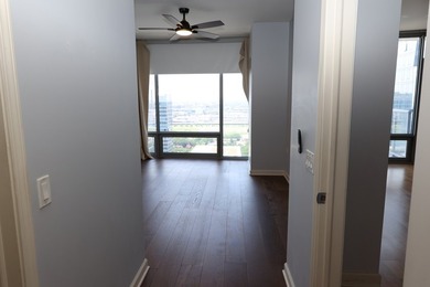 Perched on the 24th floor of sought-after 1400 Museum Park, this - photo 9
