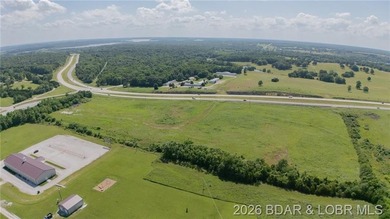 Prime 14-acre tract with 1700' of Highway 65 frontage! This - photo 2