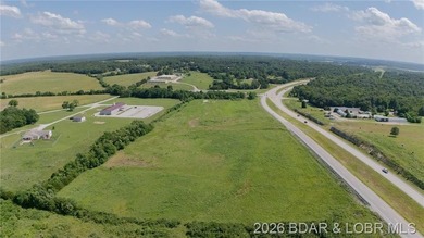 Prime 14-acre tract with 1700' of Highway 65 frontage! This - photo 3