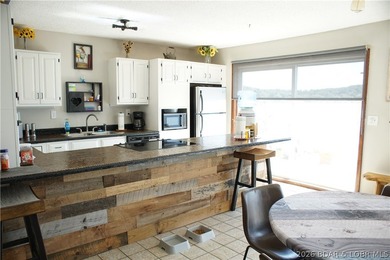 List price is below appraisal, NEW ROOF COMING SOON! Sitting at - photo 6