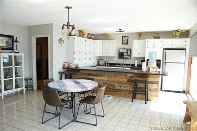 List price is below appraisal, NEW ROOF COMING SOON! Sitting at - photo 7