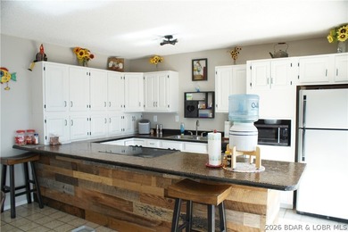 List price is below appraisal, NEW ROOF COMING SOON! Sitting at - photo 8