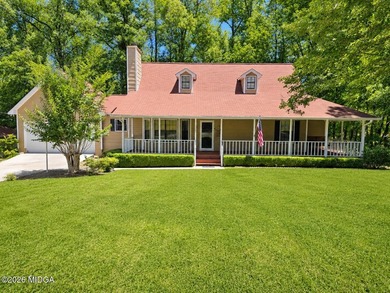 Located in the gated lake community of Lake Wildwood, this - photo 1