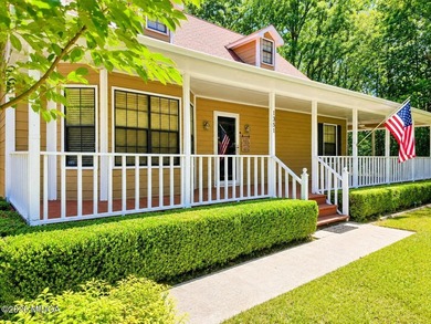 Located in the gated lake community of Lake Wildwood, this - photo 2