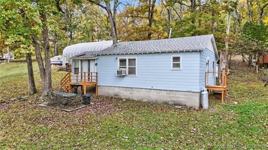 Tucked away in a quiet lakeside subdivision, this charming - photo 4