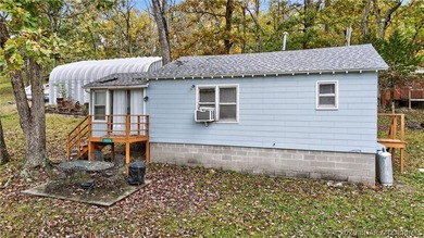 Tucked away in a quiet lakeside subdivision, this charming - photo 5