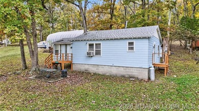 Tucked away in a quiet lakeside subdivision, this charming - photo 5
