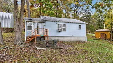 Tucked away in a quiet lakeside subdivision, this charming - photo 6