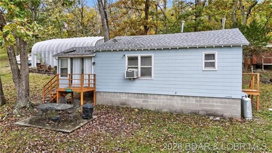 Tucked away in a quiet lakeside subdivision, this charming - photo 6
