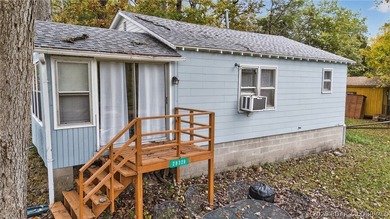 Tucked away in a quiet lakeside subdivision, this charming - photo 7
