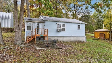 Tucked away in a quiet lakeside subdivision, this charming - photo 7