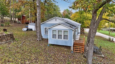 Tucked away in a quiet lakeside subdivision, this charming - photo 9