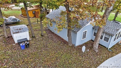 Tucked away in a quiet lakeside subdivision, this charming - photo 10