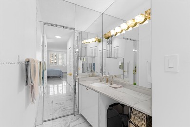 Live the ultimate beachfront lifestyle in this beautifully