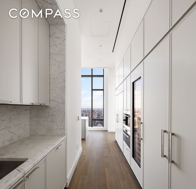 Commanding an entire floor, Penthouse 72 at Sutton Tower offers - photo 7