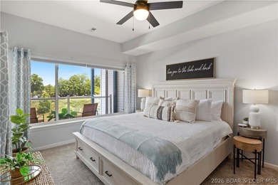 Turnkey lakefront condo at Monarch Cove offering beautiful views