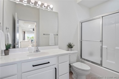 Turnkey lakefront condo at Monarch Cove offering beautiful views