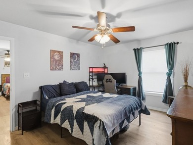 Built in 2021, this 3-bedroom, 2-bath coastal cottage sits on - photo 12