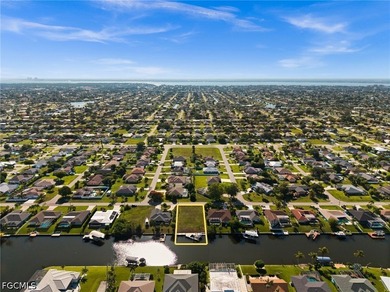 GULF ACCESS LOT WITH A NEWER SEAWALL, DOCK, CAPTAIN'S WALK, AND - photo 12