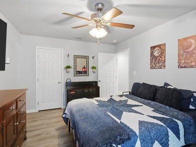 Built in 2021, this 3-bedroom, 2-bath coastal cottage sits on - photo 13