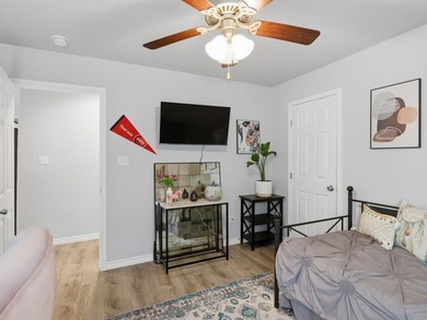 Built in 2021, this 3-bedroom, 2-bath coastal cottage sits on - photo 16