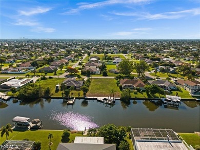 GULF ACCESS LOT WITH A NEWER SEAWALL, DOCK, CAPTAIN'S WALK, AND - photo 16