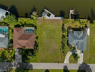 GULF ACCESS LOT WITH A NEWER SEAWALL, DOCK, CAPTAIN'S WALK, AND - photo 17