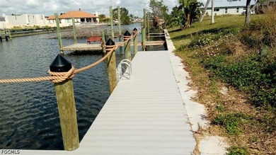 GULF ACCESS LOT WITH A NEWER SEAWALL, DOCK, CAPTAIN'S WALK, AND - photo 21