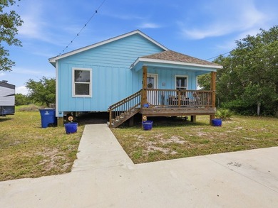 Built in 2021, this 3-bedroom, 2-bath coastal cottage sits on - photo 24