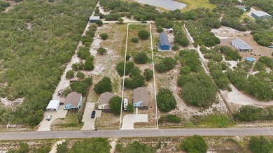 Built in 2021, this 3-bedroom, 2-bath coastal cottage sits on - photo 28